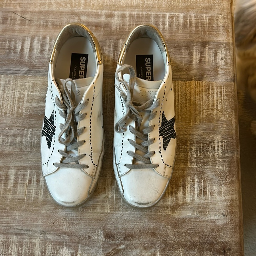 Golden Goose Super-Star size 9. White/Black/Gold